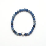 Load image into Gallery viewer, Blue camo stretch bracelet with a silver heart.
